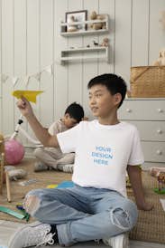 Little Asian boy wearing a T-shirt